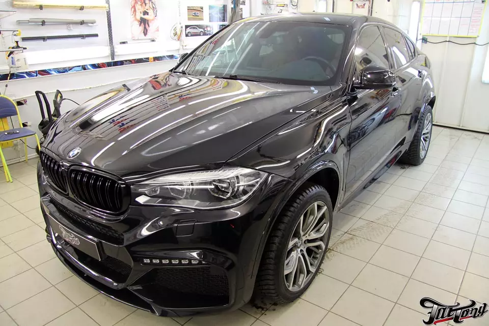 BMW X6. Антигравийная защита обвеса полиуретаном Suntek PPF.